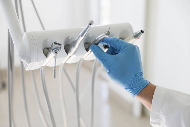 Professional Invisalign Clear Aligners technician working in Pottsboro, TX